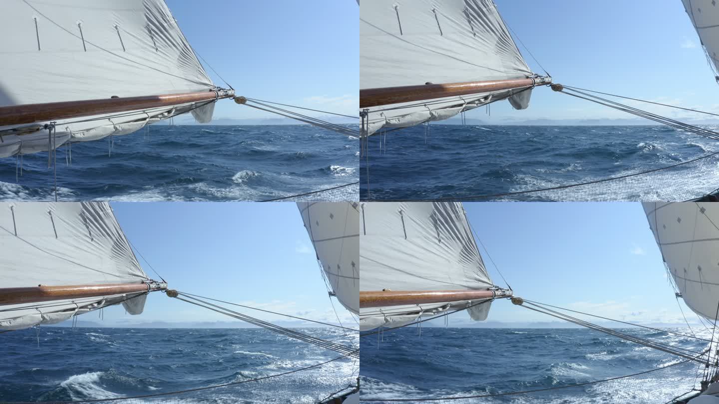 带着帆和索具沿着阳光明媚的蓝海格陵兰航行