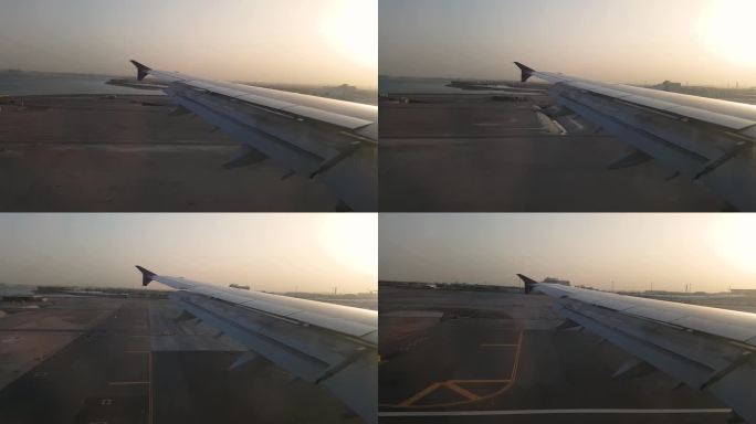飞机降落在机场的窗口视图
