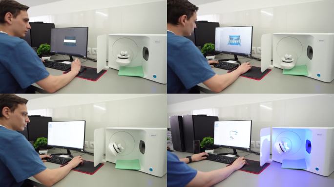 男性技术人员使用计算机程序打印3D下颌