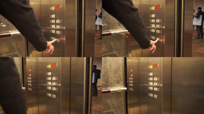 按下电梯中的按钮并提升运动