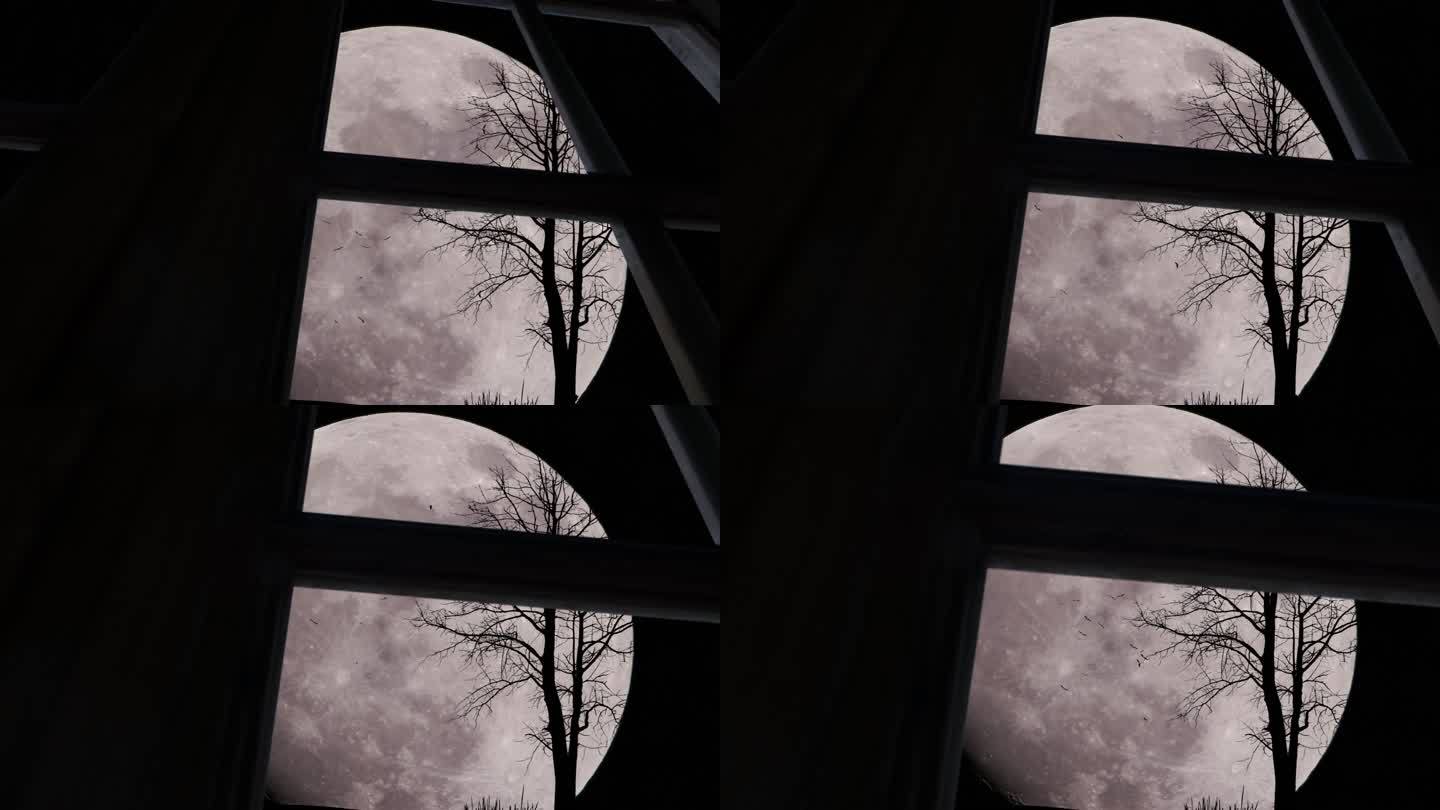 星空中的大月亮和孤零零的树