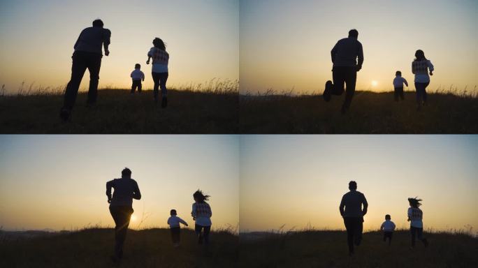 温馨家庭父母陪伴小孩山顶奔跑小孩户外运动