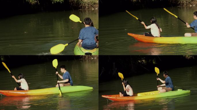 亚洲儿童在湖中学习皮划艇或独木舟，一起享受户外阳光、生活方式的概念。