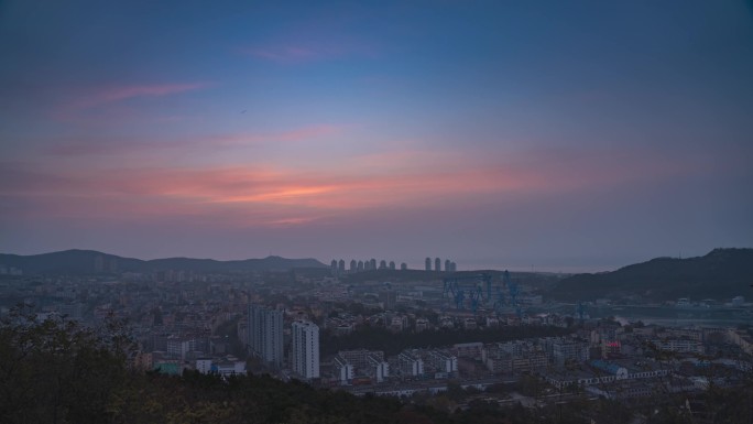 旅顺日出延时白玉塔城市苏醒早晨美好