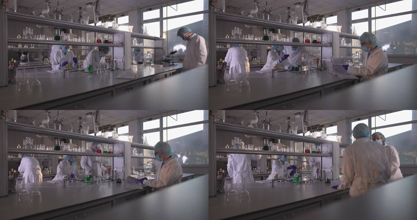 多任务医学专家在实验室工作的延时视频。