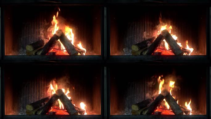 在壁炉里烧木头取暖烧柴