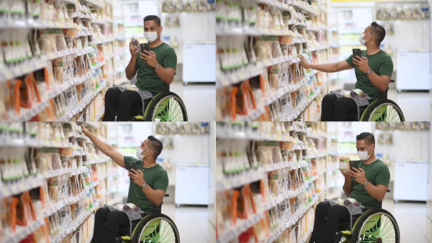 周末，亚裔印度残疾男子坐在轮椅上用智能手机在超市购物时视频通话