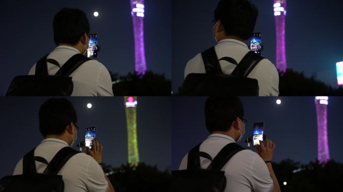 摄影爱好者晚上手机拍广州塔