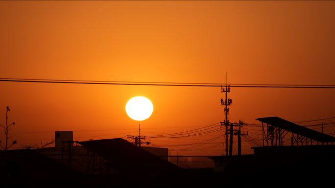 农村房顶日出延时