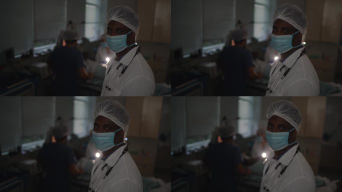 医生在手术室戴着防护面罩