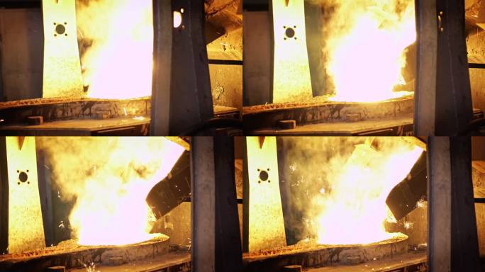 熔融金属熔化，操作员努力将熔融金属从熔炉中取出到钢包中进行浇注