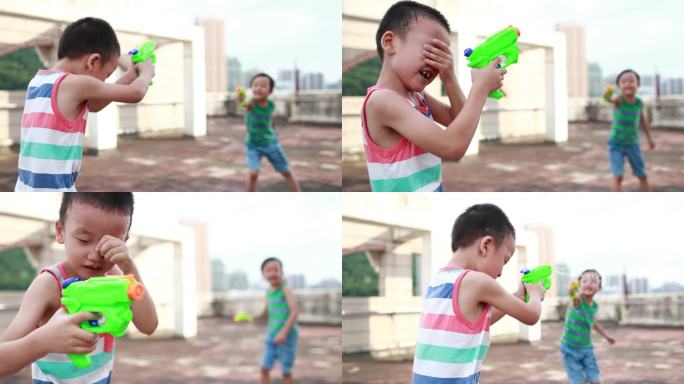玩喷枪的孩子童真孩童时期儿时回忆