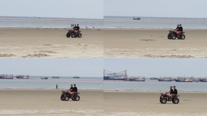 侨港海滩上开四轮摩托