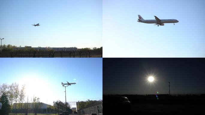 飞机落地穿过太阳逆光拍摄飞机剪影