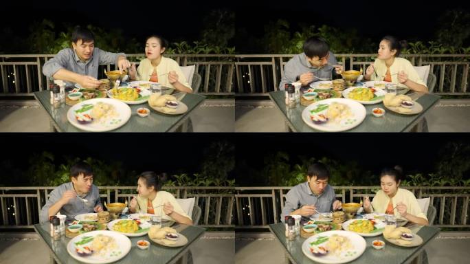 泰国男人和女人吃泰国菜晚餐