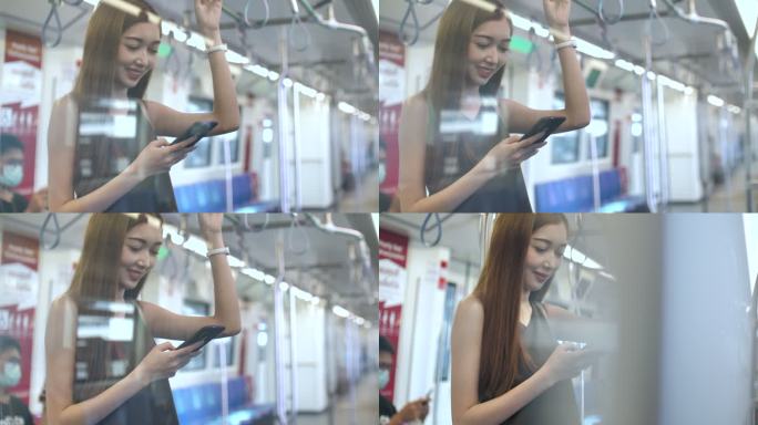 亚洲女性在地铁列车上使用手机