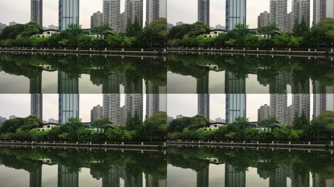 成都锦江边风景房屋倒映水中市民沿河散步
