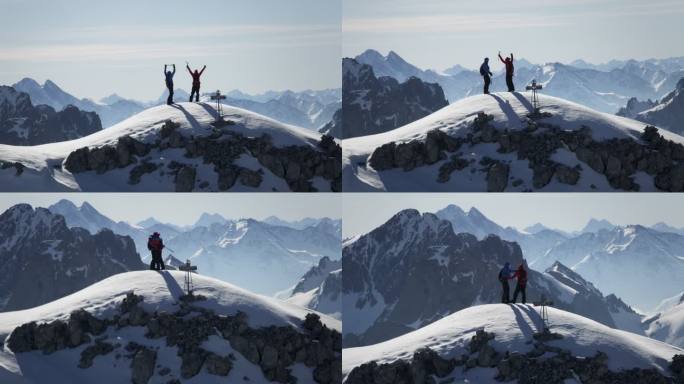 攀登者在白雪皑皑的山峰上兴高采烈