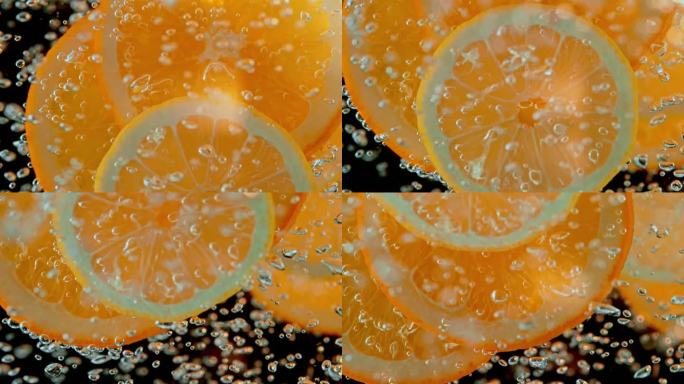 SLO MO LD漂浮在矿泉水中的橙子片