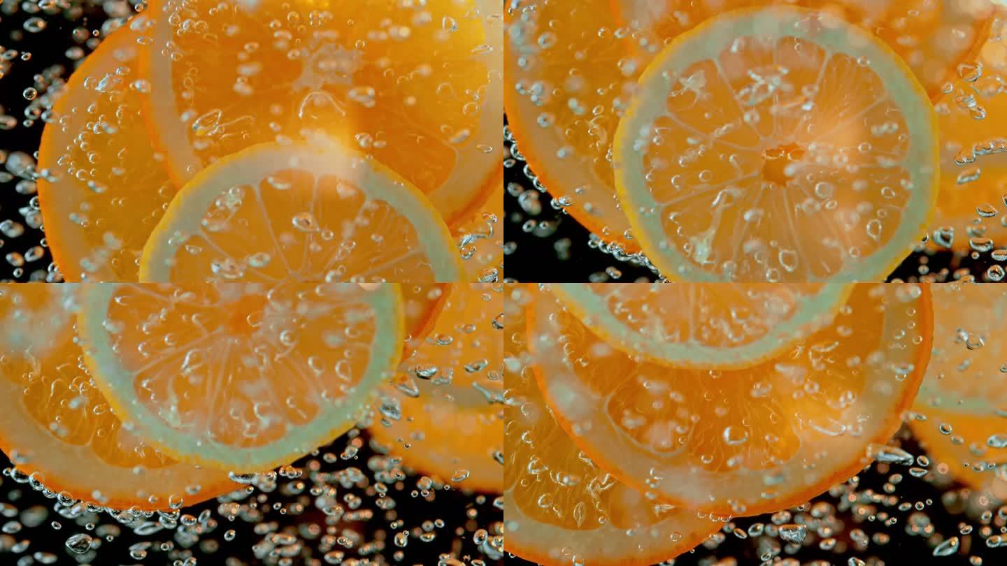 SLO MO LD漂浮在矿泉水中的橙子片