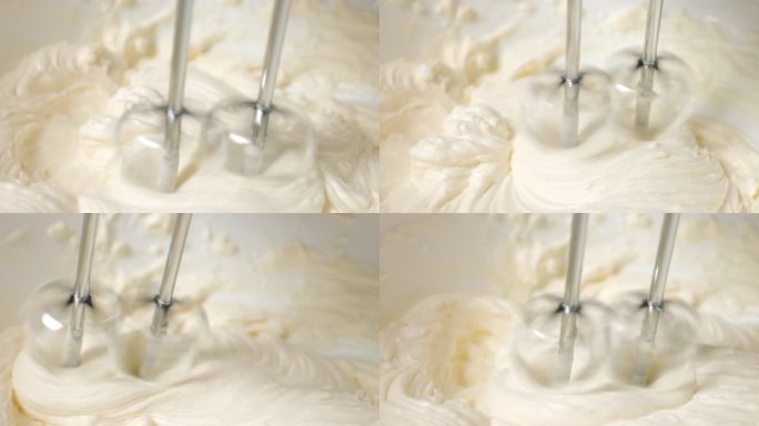 自动面粉混合机混合奶油蛋糕，在厨房准备甜点