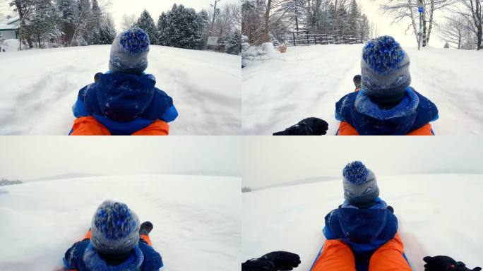 加拿大魁北克省冬天父子在雪地上滑雪的POV