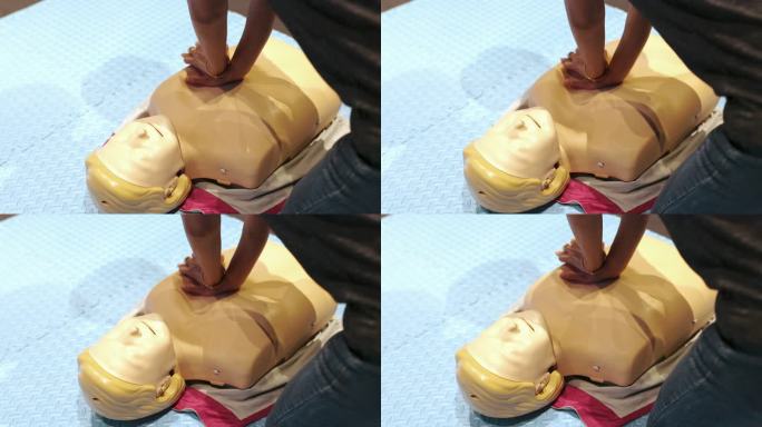 4K慢动作：心肺复苏训练班演示模拟泵、急救或医疗概念。