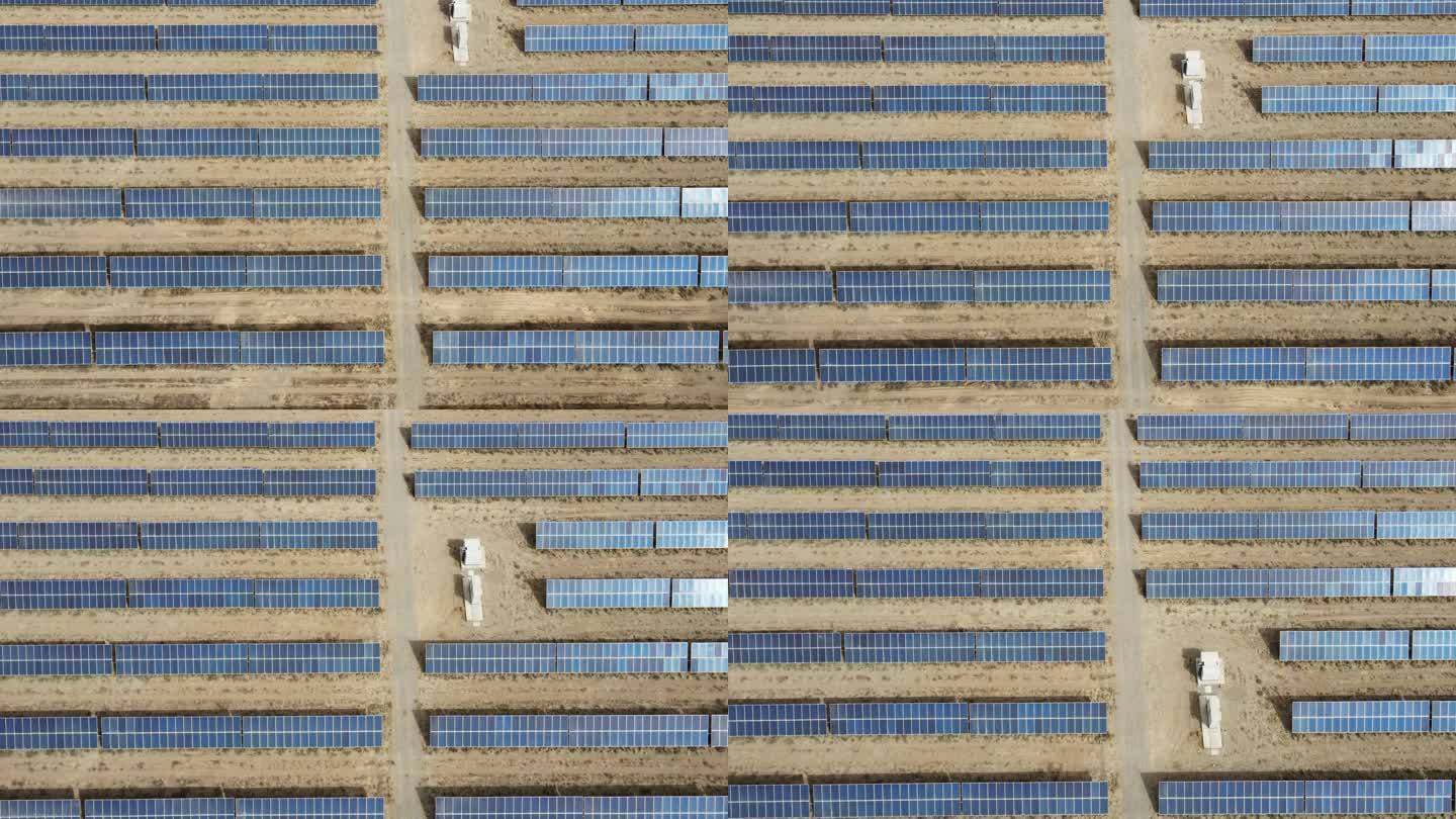 沙漠中太阳能电池板的无人机俯视图