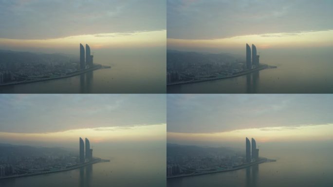清晨雾气笼罩的厦门双子塔4K航拍