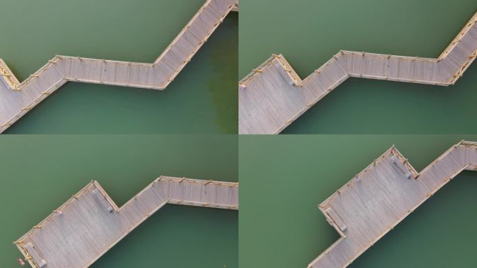 俯拍水面木质廊桥