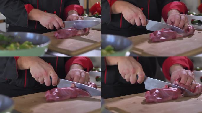 专业厨师在木制案板上将一块生肉切成两半
