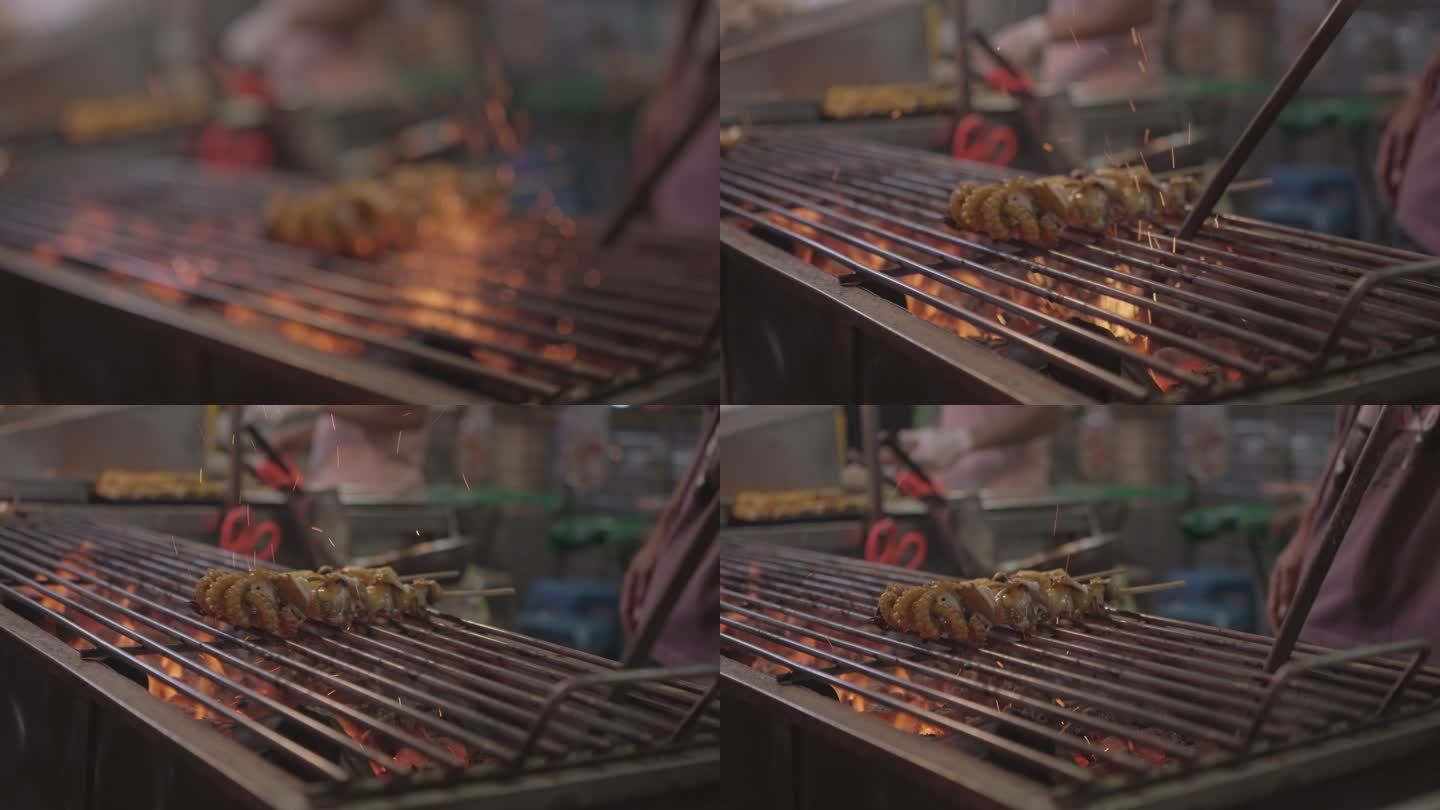 泰国曼谷耀华路煤炉上的烤鱿鱼特写
