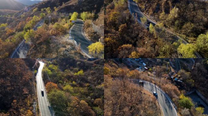 一辆黑色汽车在盘山公路行驶