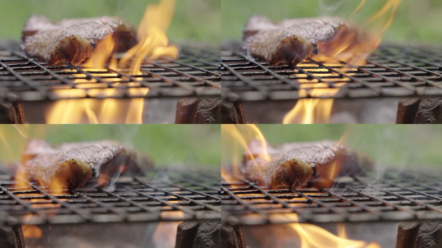 在火炉和火焰上烤猪脖子。