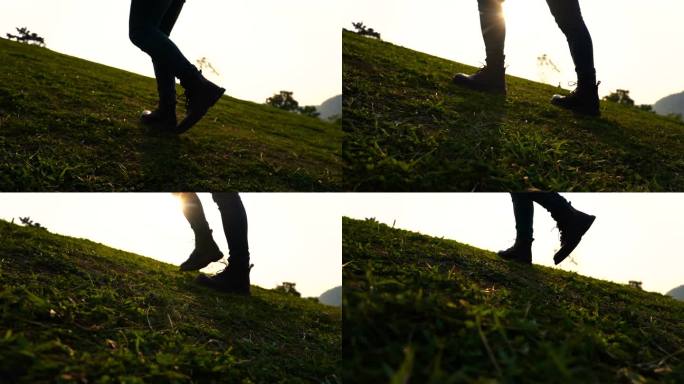 黄昏一个人登山脚步特写-男人登山靴子脚步