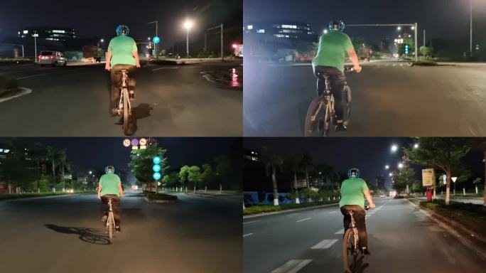 户外运动骑自行车的男子街道夜晚城市市郊