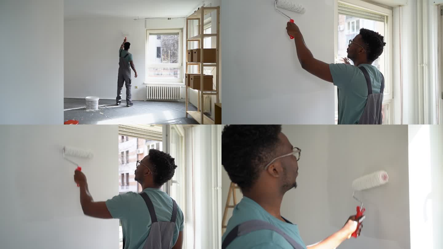 非裔美国职业画家在室内粉刷墙壁