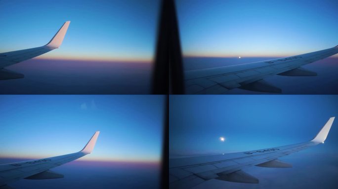 傍晚飞机飞行窗外月亮