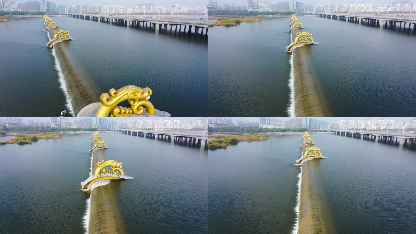 4K航拍临沂市沂河橡胶坝龙雕塑风景