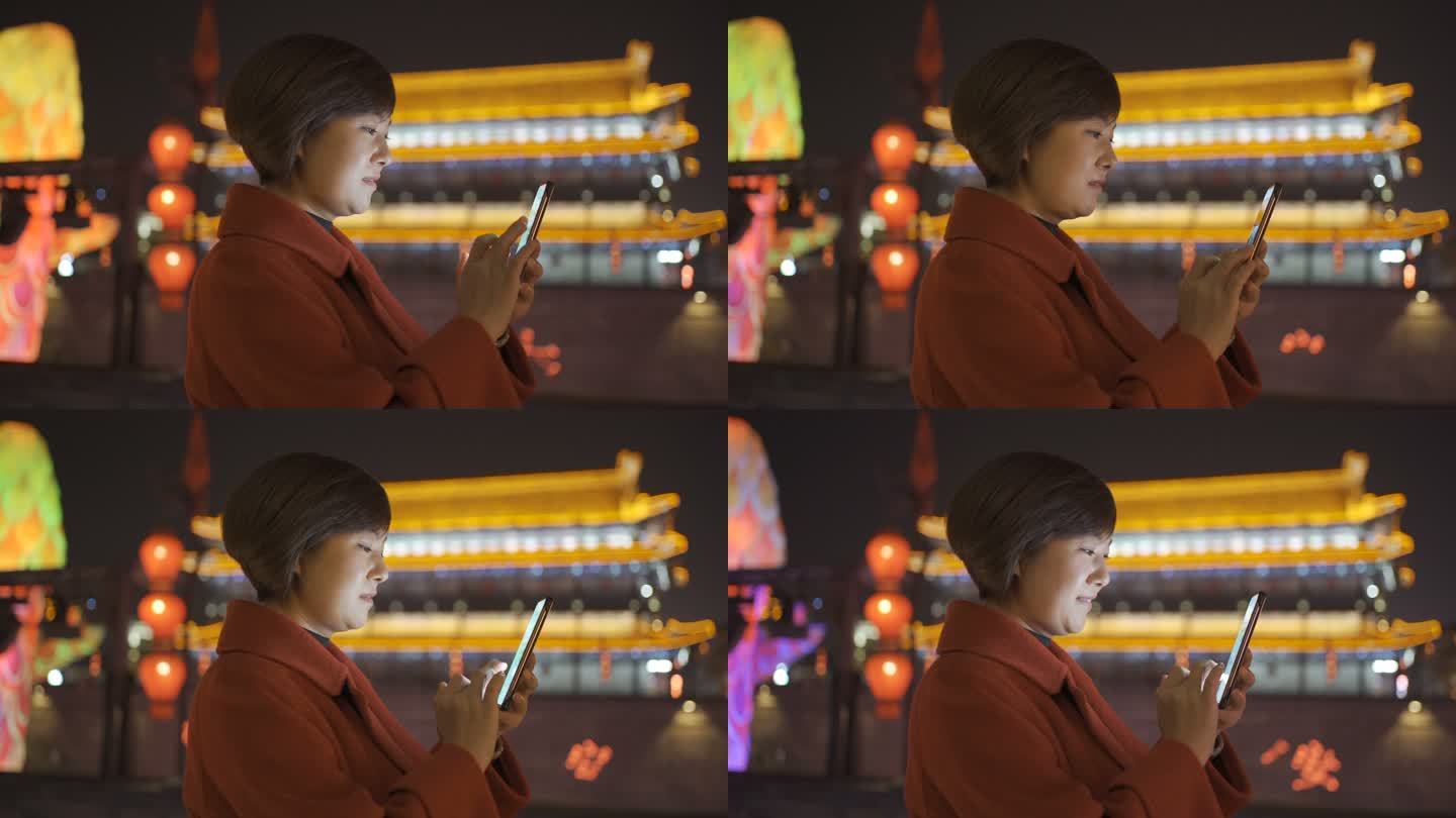 中国春节期间使用智能手机的女性