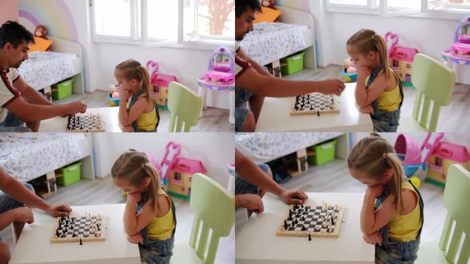 父亲和女儿下棋娱乐周末陪伴父女