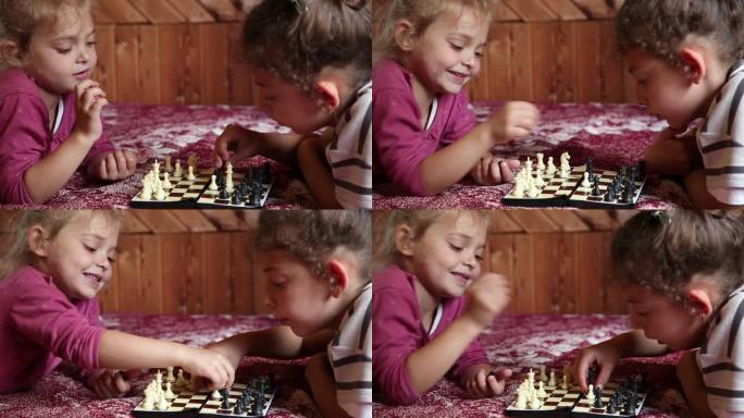 两个小女孩躺在床上下棋的特写镜头