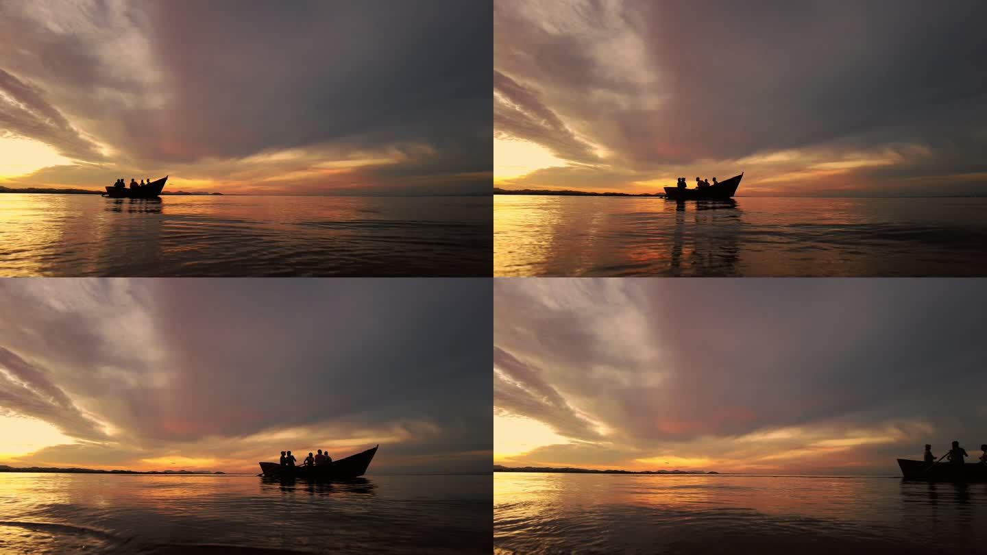 日落时渔船划过剪影