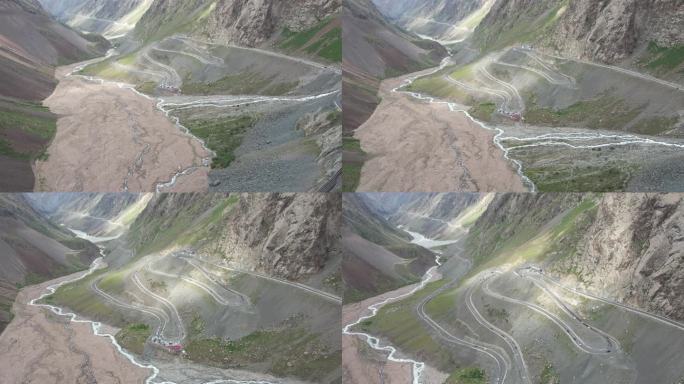 航拍新疆独库公路沿峡谷光影变化画面