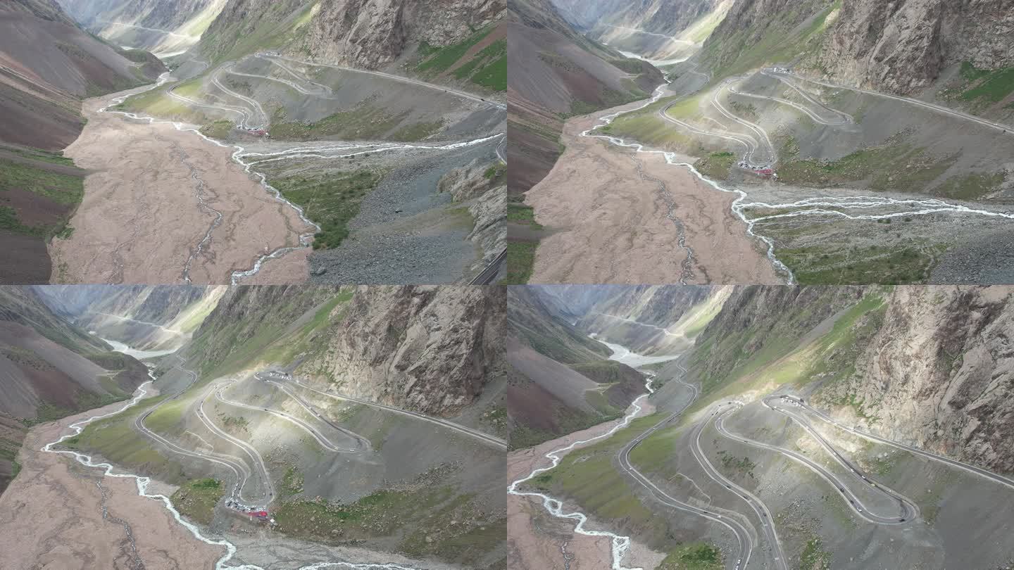航拍新疆独库公路沿峡谷光影变化画面
