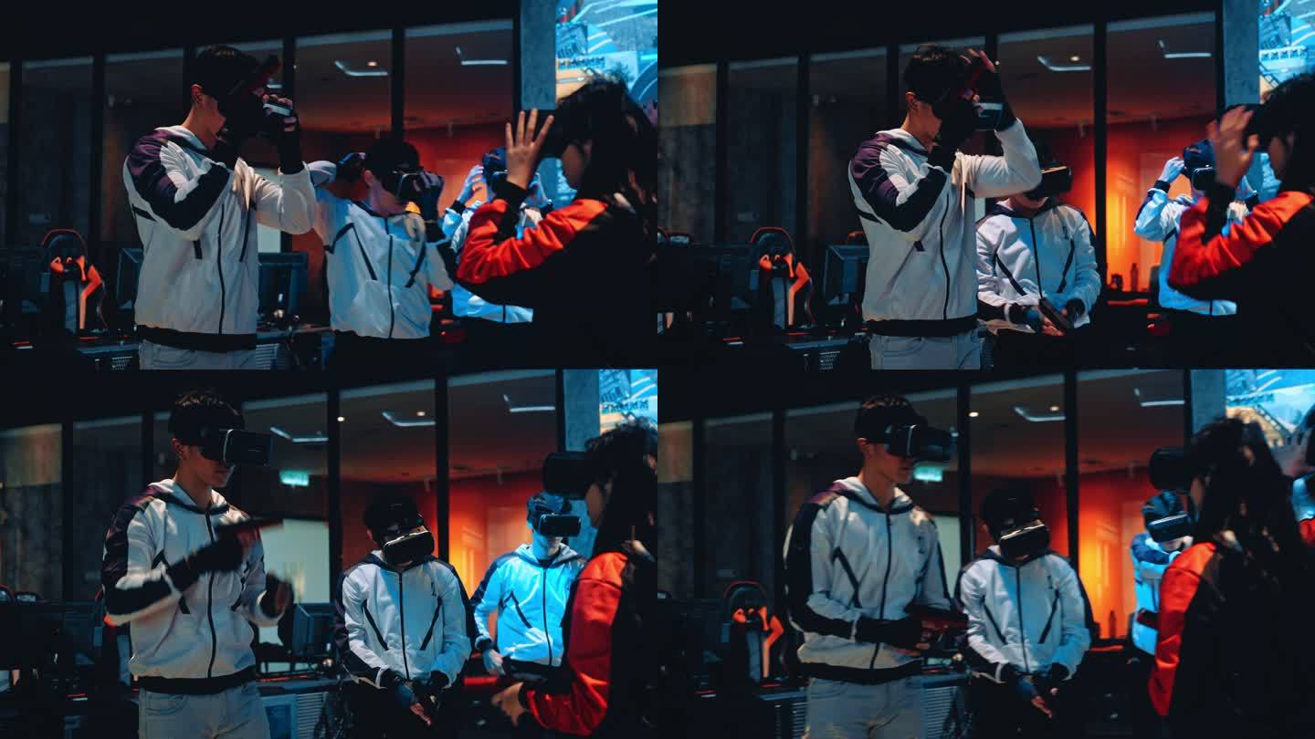 2支亚洲电子竞技队戴着VR眼镜准备在舞台上进行VR射击视频游戏，在总决赛中相互竞争