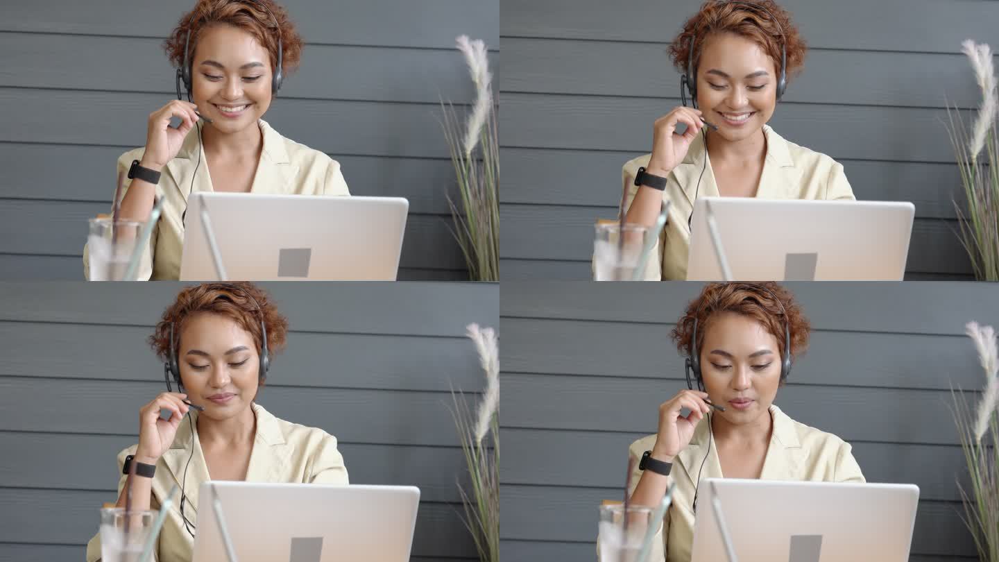 亚洲女性呼叫中心运营商咨询提供客户服务微笑提供解决方案。操作员工作。