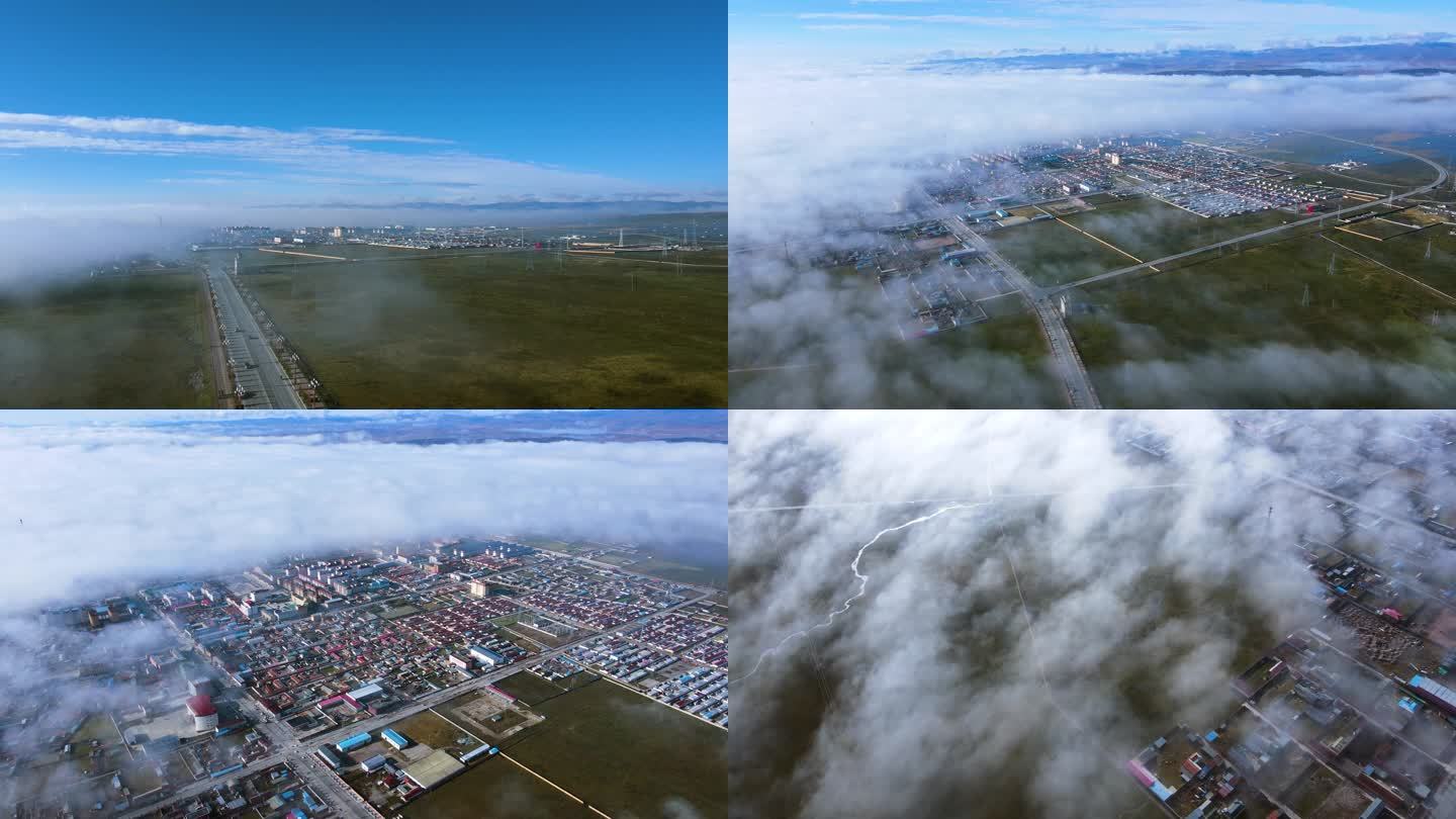 云海云雾笼罩城市高原县城草原
