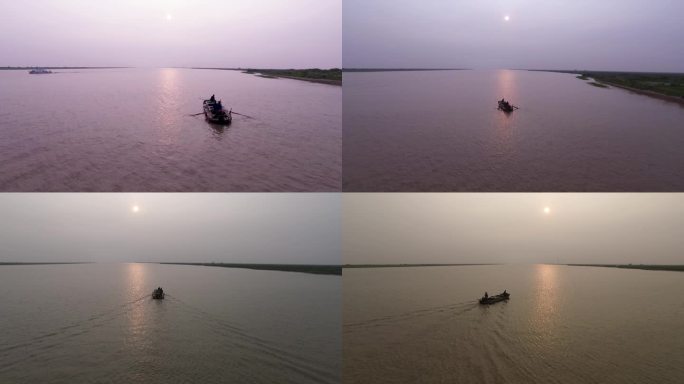 黄河小船迎着朝阳行驶的小船 河流 晨光