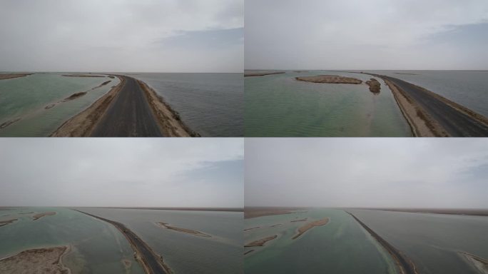 航拍青海柴达木盆地双色湖升空路面跟随画面